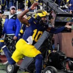 michigan’s-trick-play-fails-miserably;-backup-quarterback-gets-leveled-by-television-camera