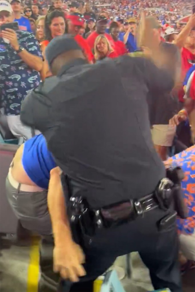 cops-pummel-fans-at-georgia-florida-football-game-in-wild-video