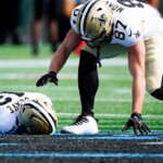 saints’-chris-olave-takes-crushing-hit-vs-panthers,-stretchered-off-the-field