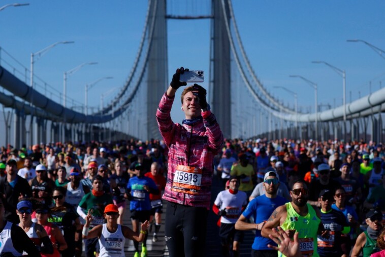 the-2024-nyc-marathon-in-photos:-see-the-annual-race-unfold-across-the-city