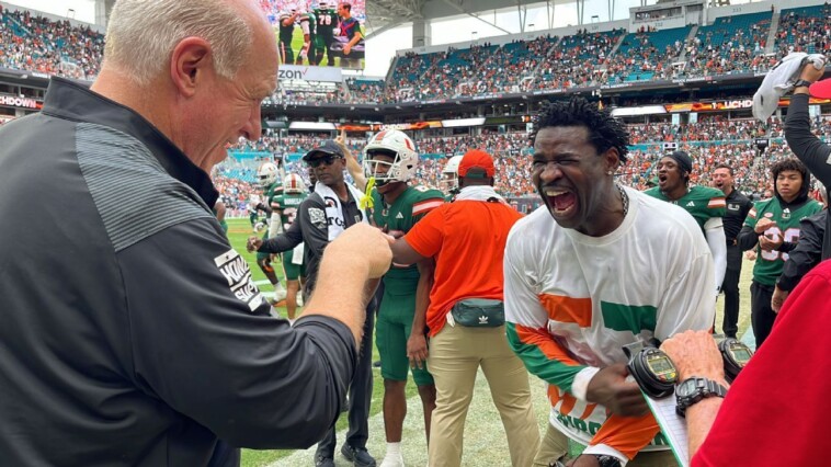 on-the-sidelines-for-a-miami-football-game-with-michael-irvin