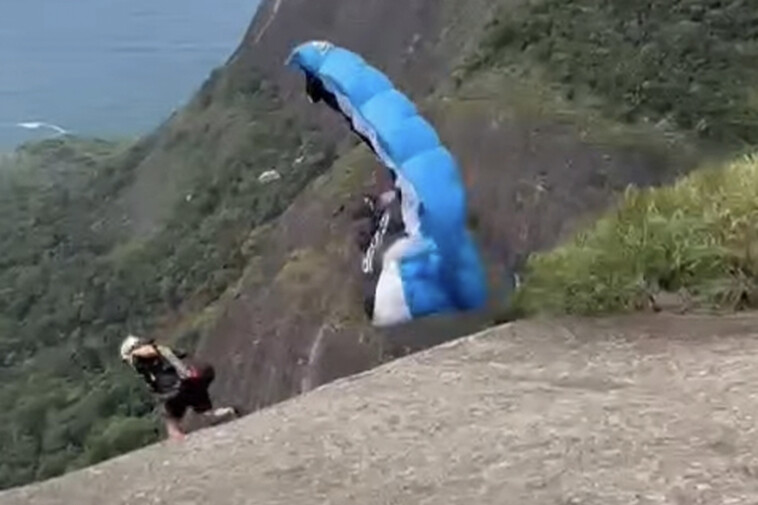 chilling-video-shows-skydiving-instructor-jumping-off-cliff-before-falling-to-his-death