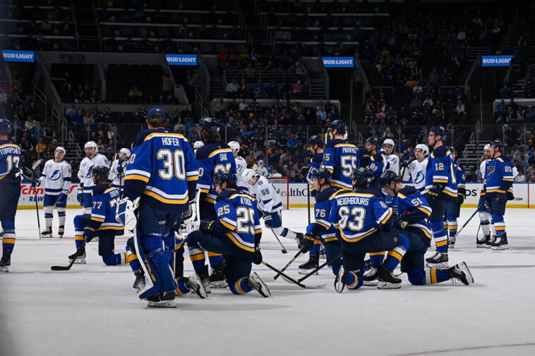 blues-lw-dylan-holloway-exits-in-stretcher,-rushed-to-hospital-after-taking-puck-to-throat