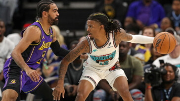 grizzlies-star-ja-morant-leaves-win-over-lakers-early-with-hamstring-injury-after-missed-dunk