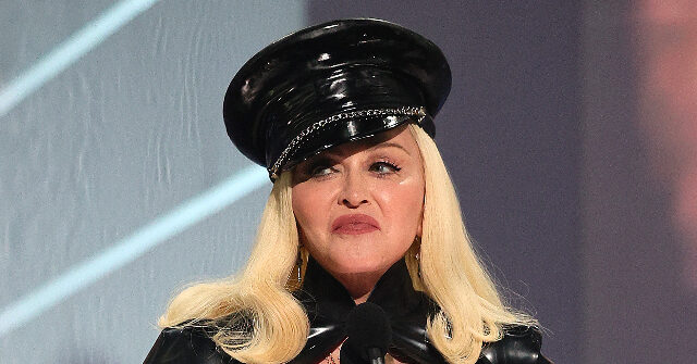 madonna-struggles-to-cope-with-kamala-losing,-stuffs-her-face-with-‘f*ck-trump’-cake