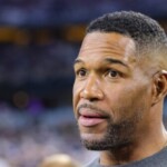 fans-demand-michael-strahan-be-fired-for-way-he-stood-during-veterans-day-weekend-national-anthem