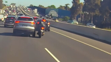 motorcyclist-collides-with-car,-lands-on-top-of-vehicle-in-insane-video