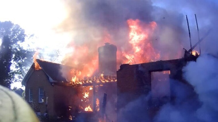 georgia-passerby-saves-man-from-burning-home-by-kicking-down-storm-door