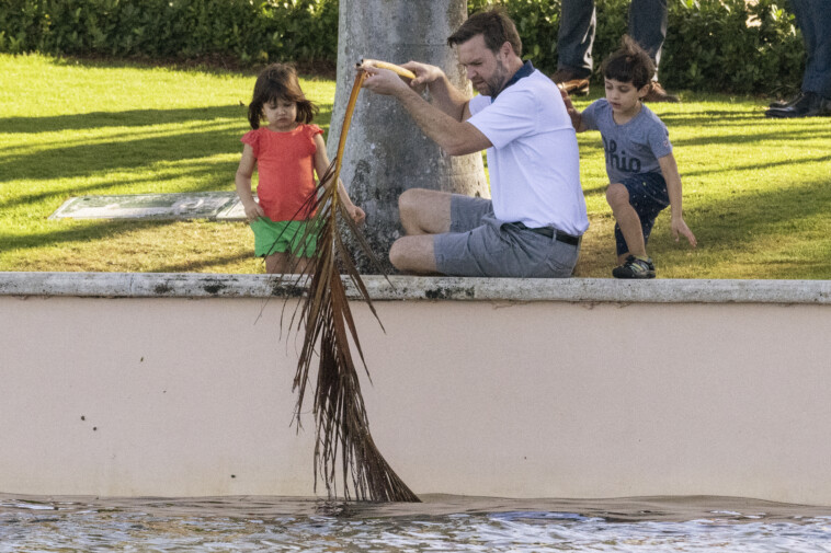 jd-vance-plays-with-his-three-young-kids-as-robot-dog-spot-stands-guard-at-mar-a-lago