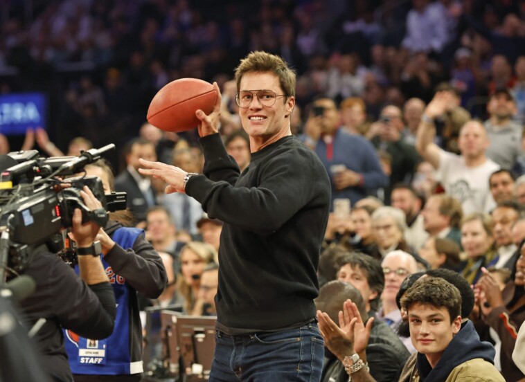 tom-brady-booed-loudly,-chucks-signed-football-into-crowd-while-courtside-at-knicks-nets