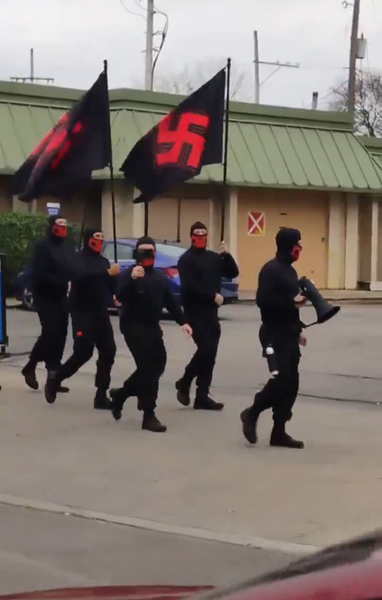 hateful-scenes-as-masked-neo-nazis-march-through-ohio-with-swastika-flags