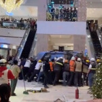 car-plunges-through-roof-of-guatemalan-mall,-killing-worker-and-leaving-trail-of-destruction