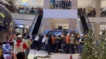 car-plunges-through-roof-of-guatemalan-mall,-killing-worker-and-leaving-trail-of-destruction