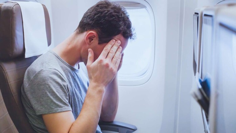 male-passenger-disappointed-after-another-flight-ends-without-a-stewardess-frantically-asking-if-anyone-can-land-the-plane