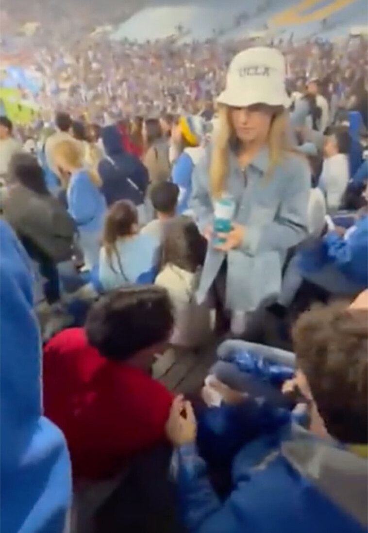 ucla-fan-smacks-usc-fan-in-the-face-during-rivalry-football-game-in-vicious-scene