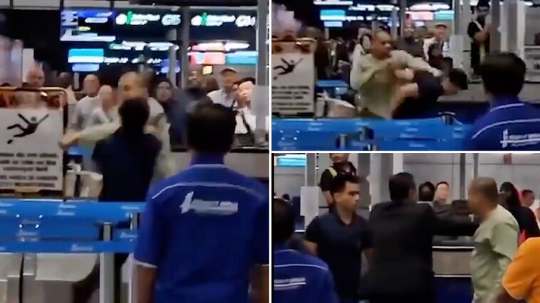 enraged-passenger-unloads-flurry-of-punches-on-airport-worker,-wild-video-shows