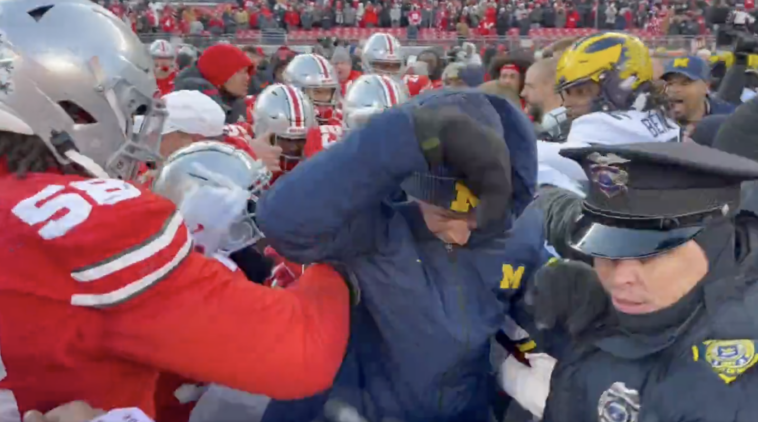 ugly-brawl-breaks-out-as-michigan-tries-planting-flag-after-upset-of-ohio-state:-‘classless’