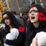 watch:-pro-palestinian-protesters-yell-at-black-friday-shoppers-near-nyc’s-rockefeller-christmas-tree