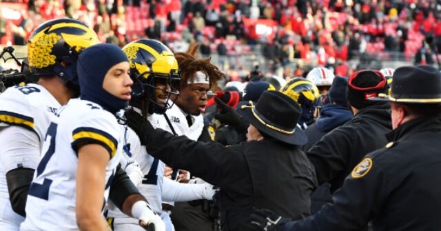 watch:-chaos-in-columbus:-ohio-state-michigan-game-ends-in-wild-brawl-after-wolverines-plant-flag-on-buckeye-logo