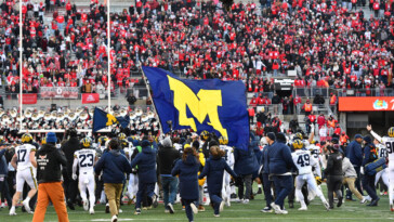 flag-planting-celebrations-cause-fights-to-break-out-in-several-heated-college-football-rivalry-games