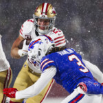 49ers-star-christian-mccaffrey-ruled-out-after-leaving-game-vs.-bills-early-with-awkward-non-contact-knee-injury