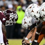 ‘another-man-&-his-dog-were-riding-a-longhorn’:-scenes-from-the-long-awaited-return-of-texas-texas-a&m