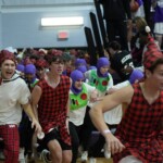 college-basketball-fans-break-silence,-storm-the-court-as-part-of-unique-christmas-tradition