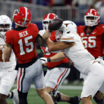 georgia-claims-sec-championship-in-overtime-against-texas,-but-loses-carson-beck-to-injury