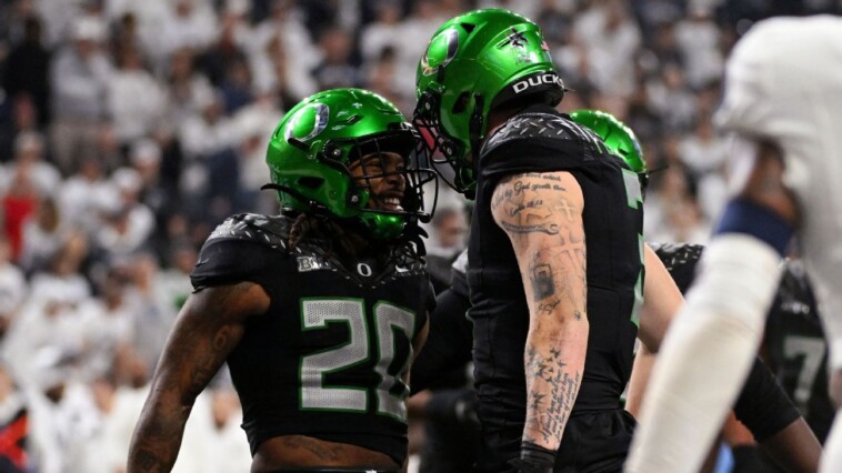 ducks-outlast-psu-to-remain-unbeaten,-clinch-bye