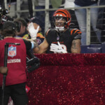 bengals-rb-chase-brown-trolls-cowboys,-ezekiel-elliott-with-jump-into-salvation-army-kettle-after-td