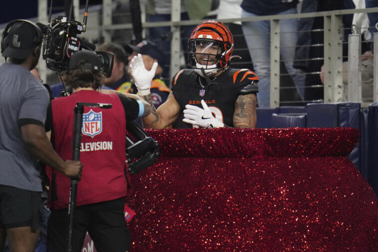 bengals-rb-chase-brown-trolls-cowboys,-ezekiel-elliott-with-jump-into-salvation-army-kettle-after-td