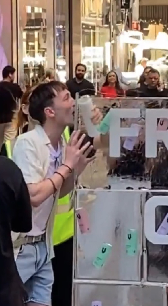 man-finds-himself-in-sticky-situation-after-licking-frozen-display-at-outdoor-mall