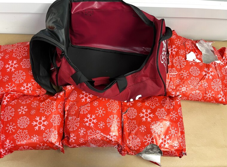 woman-smuggled-22-pounds-of-meth-wrapped-as-christmas-gifts-in-carry-on-bag:-police