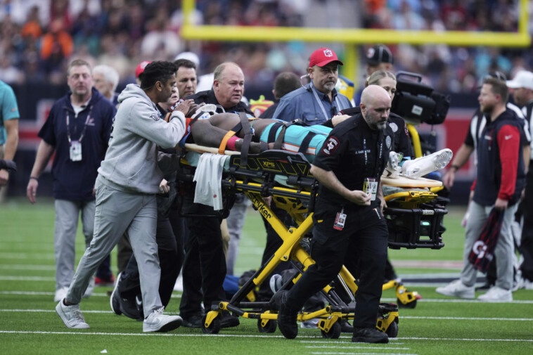 dolphins-wr-grant-dubose-leaves-field-on-stretcher-with-jersey-cut-off-after-frightening-hit-to-head-vs.-texans