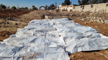 syrian-mass-grave-is-largest-uncovered-since-stalin-era-as-100,000-bodies-were-discarded-outside-damascus:-advocacy-group