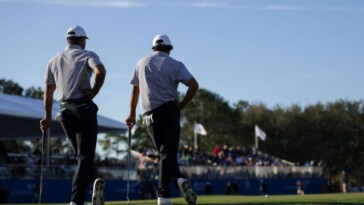 tiger,-son-charlie-close-strong,-share-pnc-lead