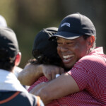 charlie-woods-nails-his-first-hole-in-one,-shares-huge-hug-with-dad-tiger-in-wild-pnc-championship-moment