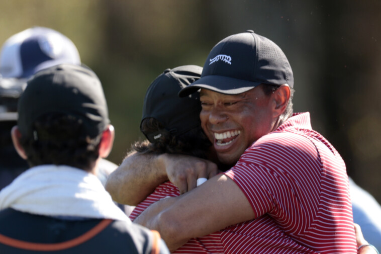 charlie-woods-nails-his-first-hole-in-one,-shares-huge-hug-with-dad-tiger-in-wild-pnc-championship-moment