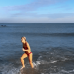 livvy-dunne-takes-polar-plunge-in-red-bikini-on-christmas-eve