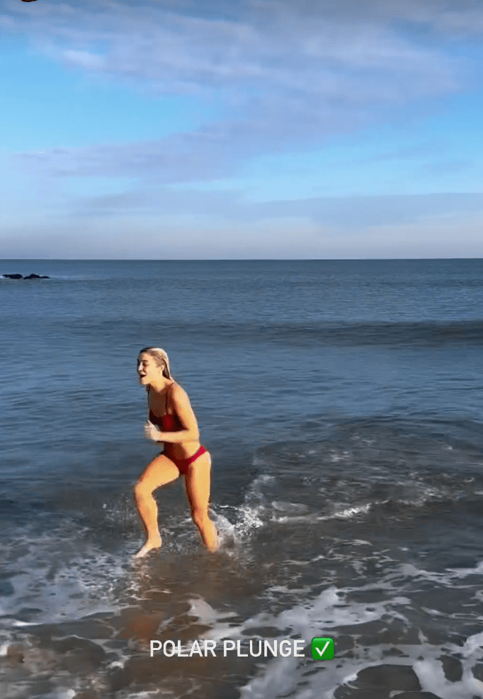 livvy-dunne-takes-polar-plunge-in-red-bikini-on-christmas-eve