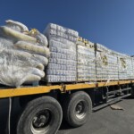 humanitarian-aid-stacks-up-at-gaza-border-as-relief-organizations-fear-hamas,-violent-looters