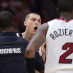 amen-thompson-throws-tyler-herro-to-the-court,-sparking-massive-brawl-in-heat-rockets-game