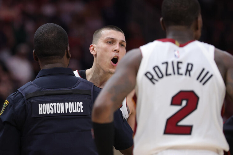 amen-thompson-throws-tyler-herro-to-the-court,-sparking-massive-brawl-in-heat-rockets-game