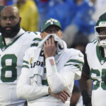 aaron-rodgers-hits-new-jets-low-with-being-pulled-vs.-bills-as-potential-breakup-looms