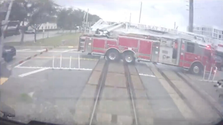 video-shows-shocking-moment-high-speed-train-collides-with-a-florida-fire-truck-that-drove-onto-tracks