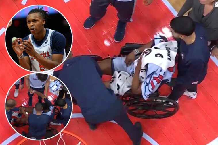 wizards’-carlton-carrington-exits-in-wheelchair-after-hitting-head-on-court-in-scary-injury-scene