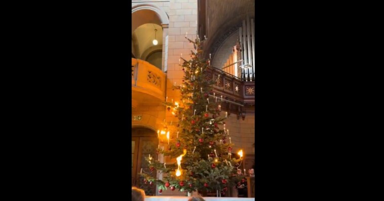 fiery-display:-church-lights-50+-christmas-tree-candles-in-45-seconds-in-breathtaking-display