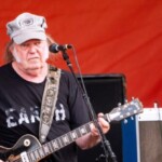 neil-young-drops-out-of-glastonbury-2025,-claiming-festival-is-‘under-corporate-control’-of-british-broadcasting-corporation