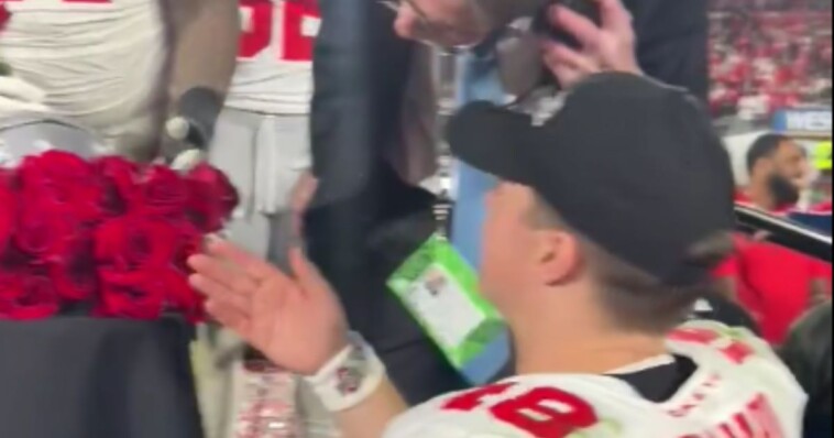 video:-star-ohio-state-qb-blocked-from-celebrating-rose-bowl-win-with-teammates-on-stage