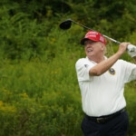 trump-interrupted-golf-game-to-convince-gop-holdouts-to-vote-for-house-speaker-mike-johnson,-lawmaker-says